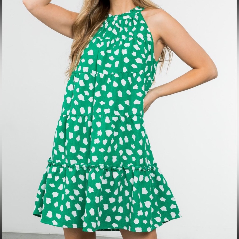 New with tags, THML green cheetah halter style dress. Lined.